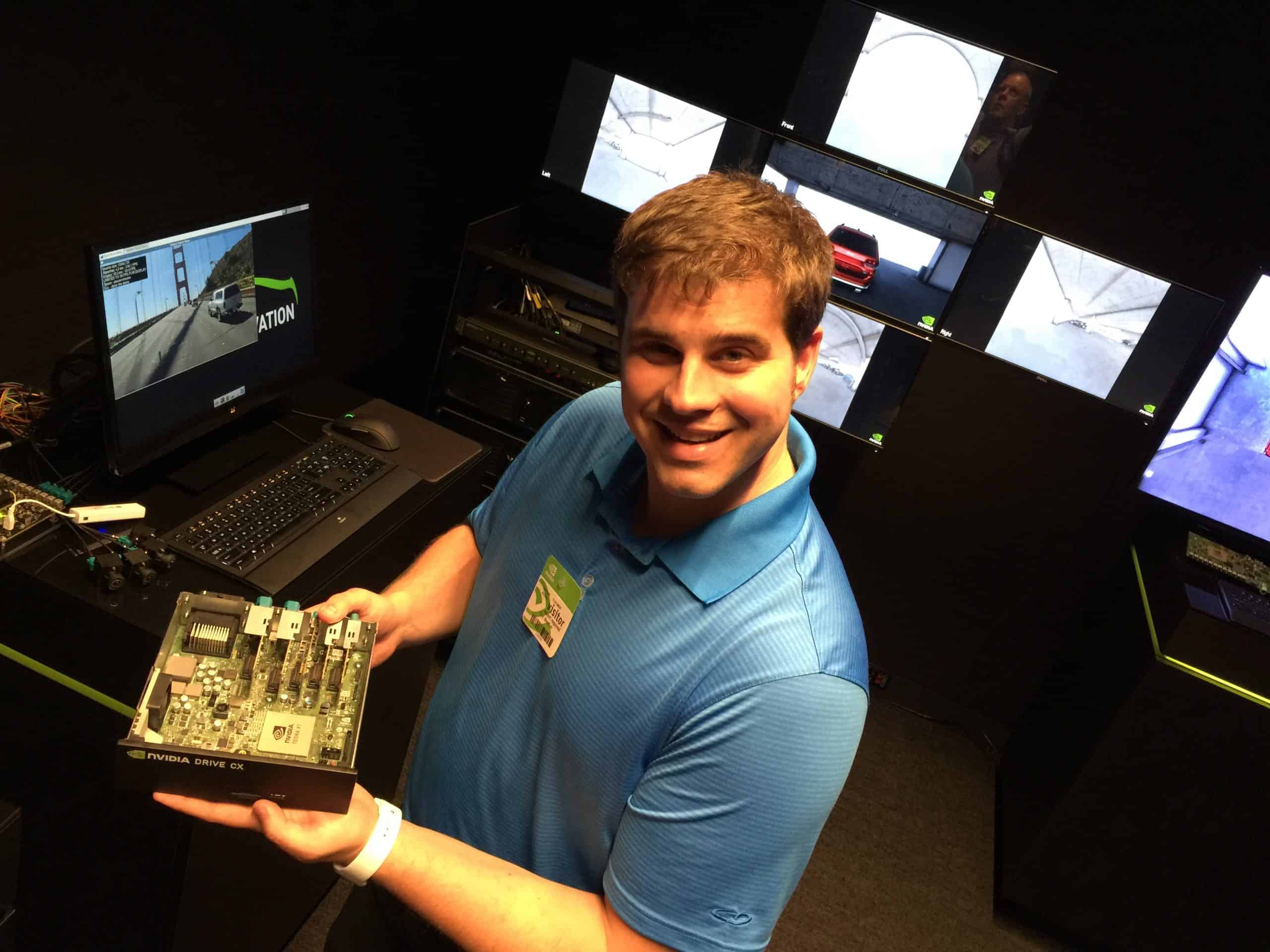 Eric Bleeker Holding a Self-Driving Chip at NVIDIA's Headquarters