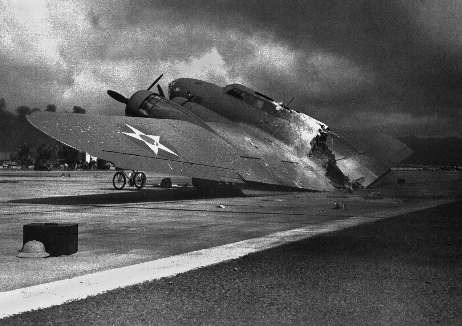 Ruins of a B-17C aircraft rests near at Hickam Field after the Japanese attack on Pearl Harbor, Dec. 7, 1941. Nearly half of the approx. 60 airplanes at Hickam Field had been destroyed or damaged.