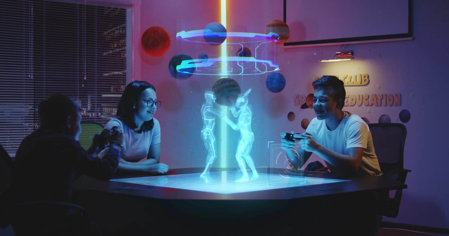 Medium long shot of teenagers playing holographic video game