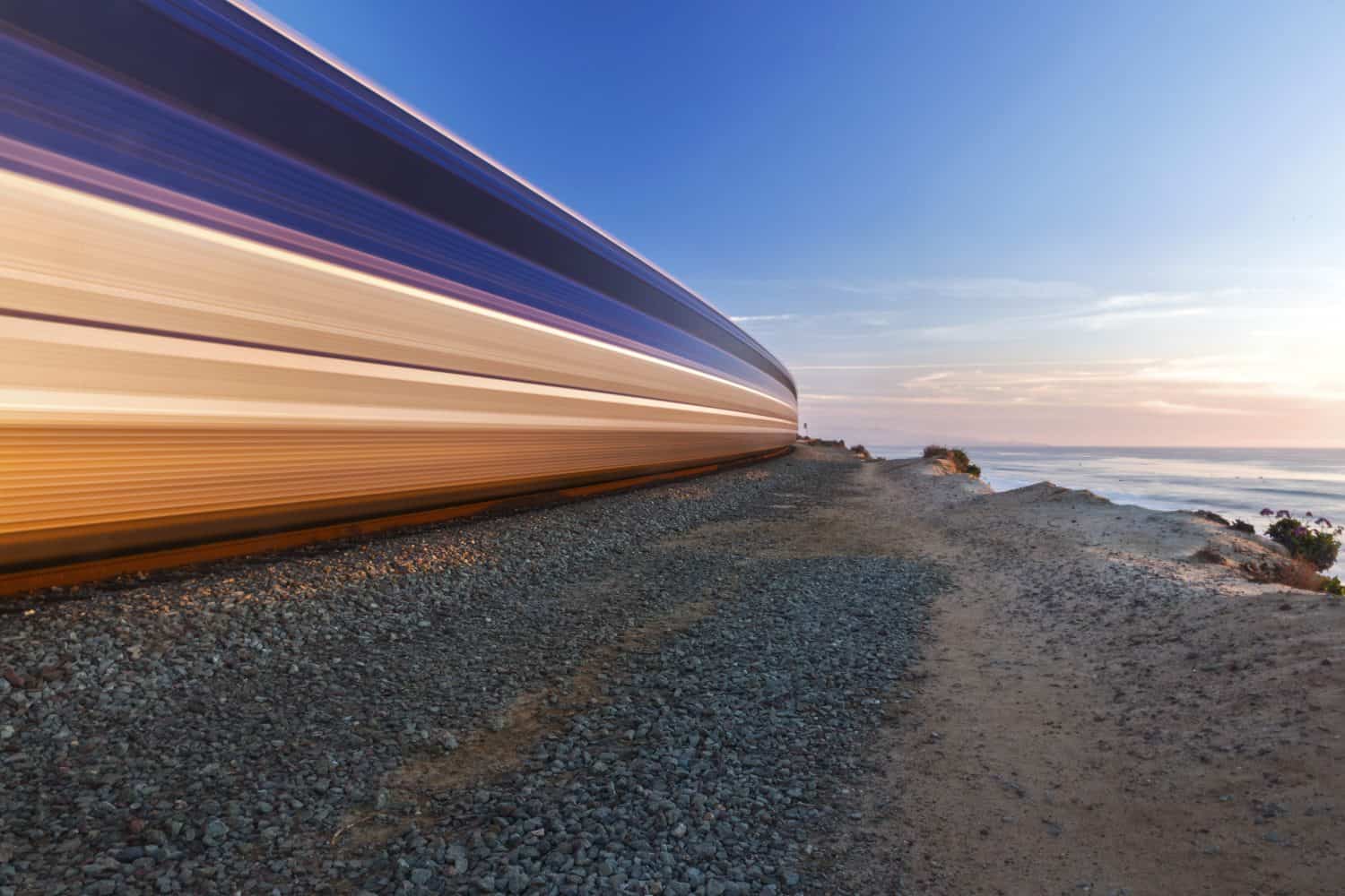 High Speed Train passing through Del Mar Heights along Pacific Coastline in San Diego County Southern California