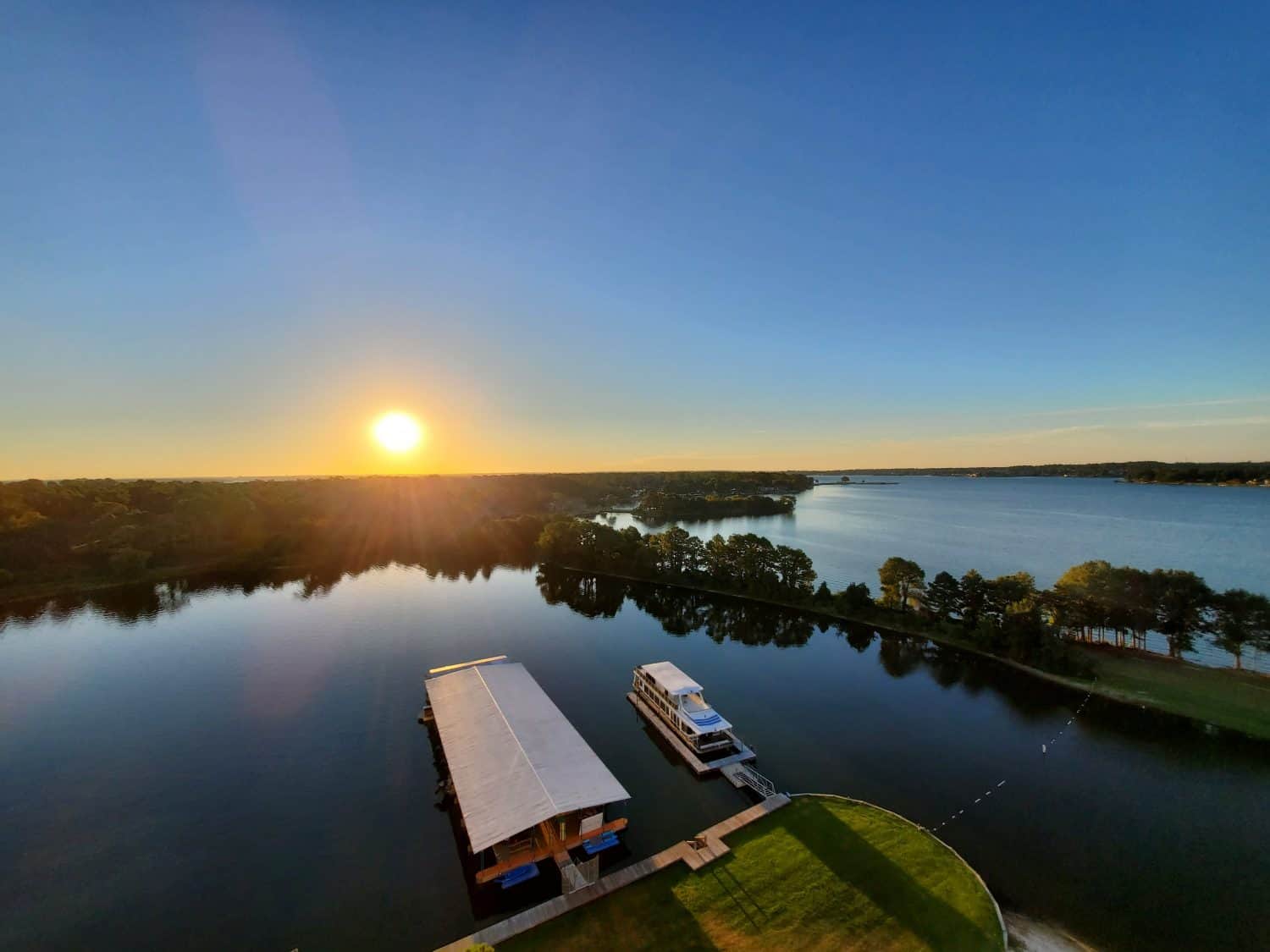 Panoramic sunrise scene over Lake Conroe, Texas.