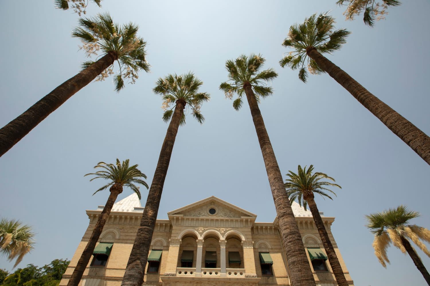 Afternoon sun shines on historic buildings of downtown Hanford, California, USA.