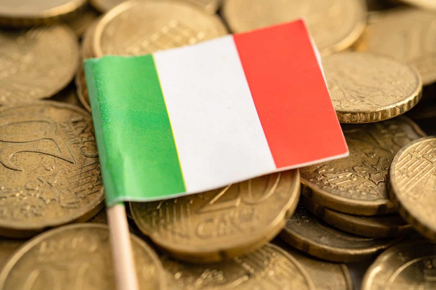 Italy flag on coins money, finance and accounting, banking concept.