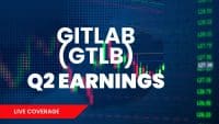 A graphic with white text "GITLAB (GTLB) Q2 EARNINGS" centered on a dark blue background patterned with small dots. Behind the text are blurred financial charts showing green and red candlesticks and line graphs, along with columns of numbers like "128.50" and "127.34". A red banner at the bottom left reads "LIVE COVERAGE" in white capital letters.