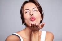 Woman blowing a kiss