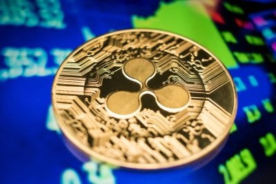 Golden Ripple XRP Coin on Futuristic Digital Technology Background
