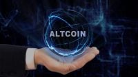 Painted hand shows concept hologram Altcoin on his hand. Drawn man in business suit with future technology screen and modern cosmic background