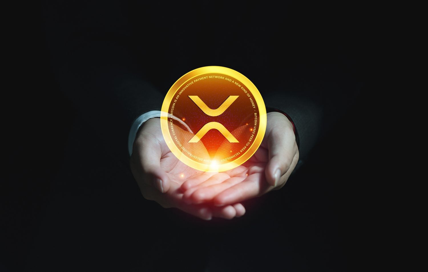 Businessman hand holding cryptocurrency XRP Ripple coin, Virtual money for internet banking and digital payment concept