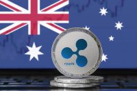 RIPPLE (XRP) cryptocurrency; physical concept ripple coin on the background of the flag of Australia (Australian Union)