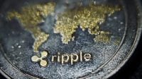 Digital currency physical metal silver ripple coin. Cryptocurrency macro concept.