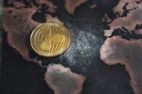 Gold Ripple XRP Coin Token on World Map in North America