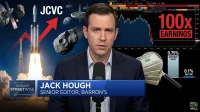 A composite image shows Barron's Senior Editor Jack Hough speaking into a microphone in the center. To his left, a rocket launches into space with asteroids and planets, above which the letters 'JCVC' and a large red upward arrow are displayed. To his right, a financial graph shows market data, with '100x EARNINGS' in red text, a magnifying glass over stacks of dollar bills, and a bar chart indicating '0.75% EXPENSE RATIO' and '0.1% S&P 500'. A blue lower third banner identifies him as 'JACK HOUGH SENIOR EDITOR, BARRON'S'. The overall mood is informative and serious, combining themes of space exploration and financial analysis.