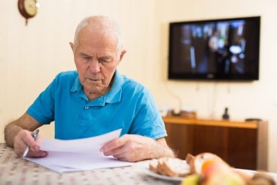 A 71-Year-Old Retired Federal Employee With $890,000 in a TSP Discovers His Pension Quietly Disqualified Him for the IRMAA Hold-Harmless Rule