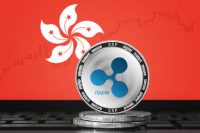 RIPPLE (XRP) cryptocurrency; physical concept ripple coin on the background of the flag of Hong Kong