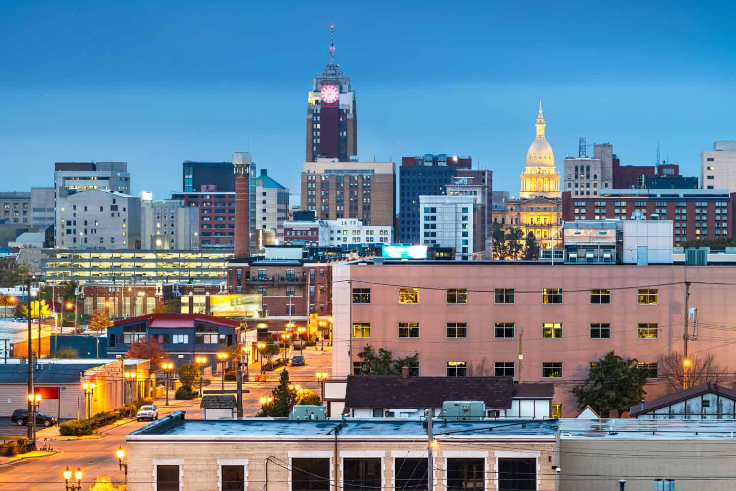 Lansing, Michigan, USA downtown city skyline at twilight.