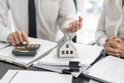 Business people signing contract making deal with real estate agent Concept for consultant home insurance Real estate investment Property insurance security. Real estate agent.