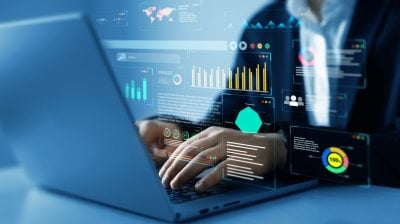 Businessman using KPI dashboard.Financial business KPI System data analytics graph dashboard.Data System KPI and metrics connected in database for follow earnings,operations and sales data.