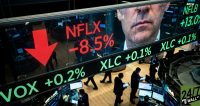 Using a transparent glass ticker wall creates a modern, 'high-finance' aesthetic. The high-angle perspective and the use of 'visual vibration' through complementary red and green lights ensure the image pops against the white or grey backgrounds of news aggregators.