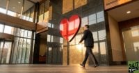 This prompt focuses on corporate momentum. The low-angle and blurred movement suggest a company in transition, emphasizing the scale of CVS Health as a major corporate entity within a high-traffic financial district.