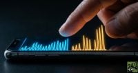 The contrast between frequent monthly pulses and larger quarterly steps creates a visual rhythm that represents the different payout cadences. The macro focus on the screen creates a sense of immediacy and importance, stopping the scroll through high-tech financial aesthetics.
