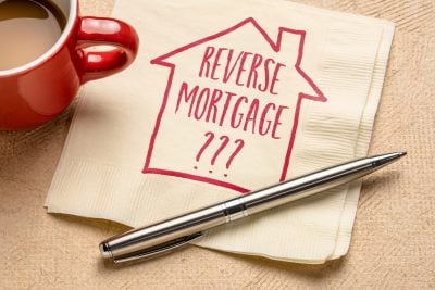 reverse mortgage question - writing and sketch on a napkin, finance and retirement concept