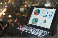 investment portfolio on screen laptop computer with index stock market and chart with uptrend stock market graph.