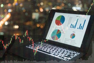 investment portfolio on screen laptop computer with index stock market and chart with uptrend stock market graph.
