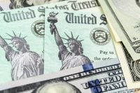 Macro view of the Statue of Liberty on United States Treasury Checks.