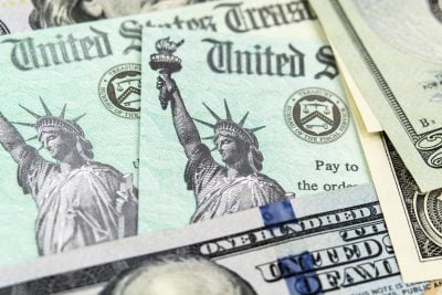 Macro view of the Statue of Liberty on United States Treasury Checks.