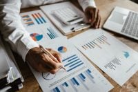 Financial Analyst Documents include charts, tax information and marketing strategies, with a focus on audit processes, compliance, risk management and company growth analysis.