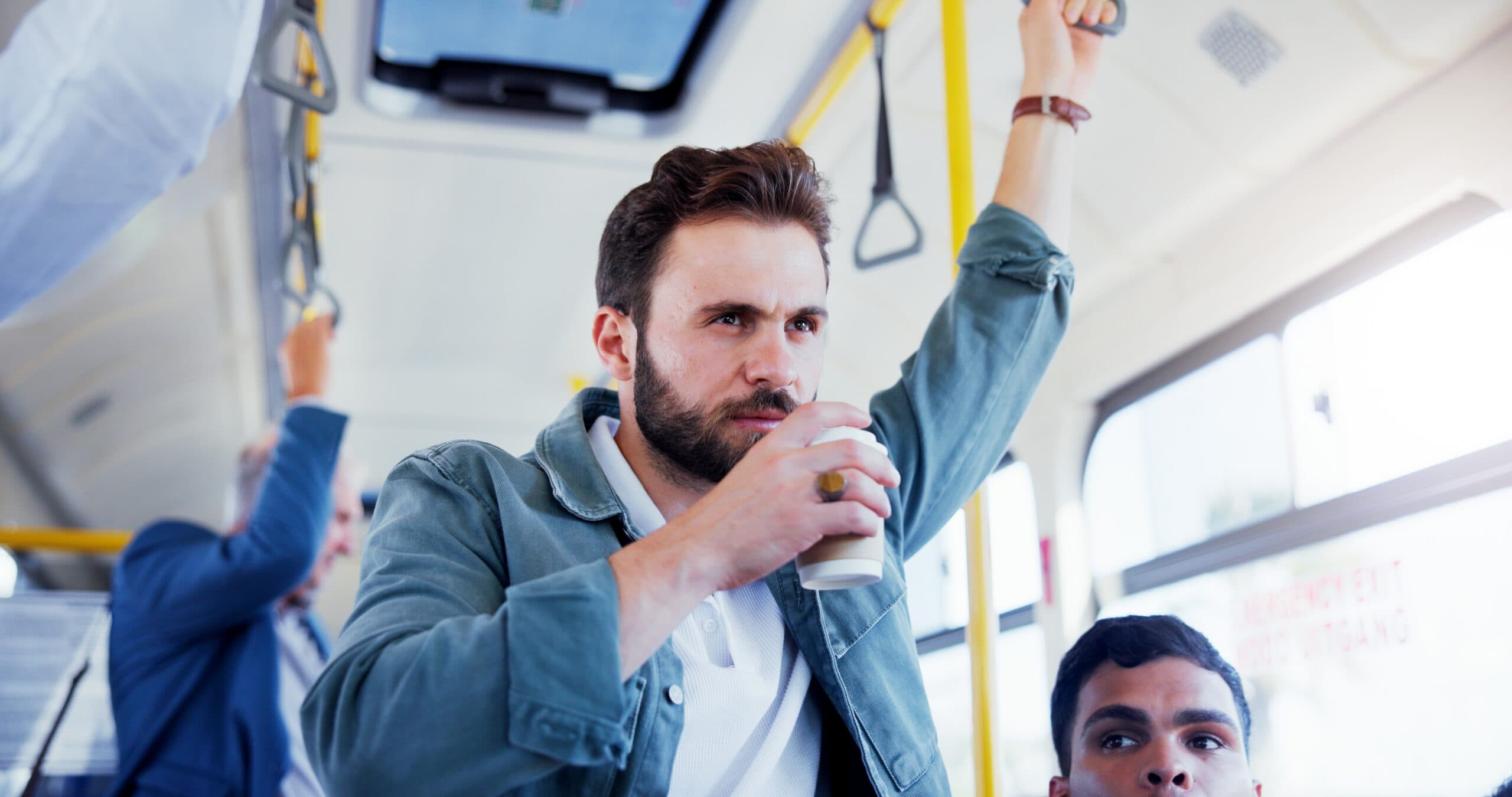 Coffee, commute and thinking with businessman on bus for public transportation to work destination. Idea, drink and waiting with passenger person on vehicle for morning drive or travel to job