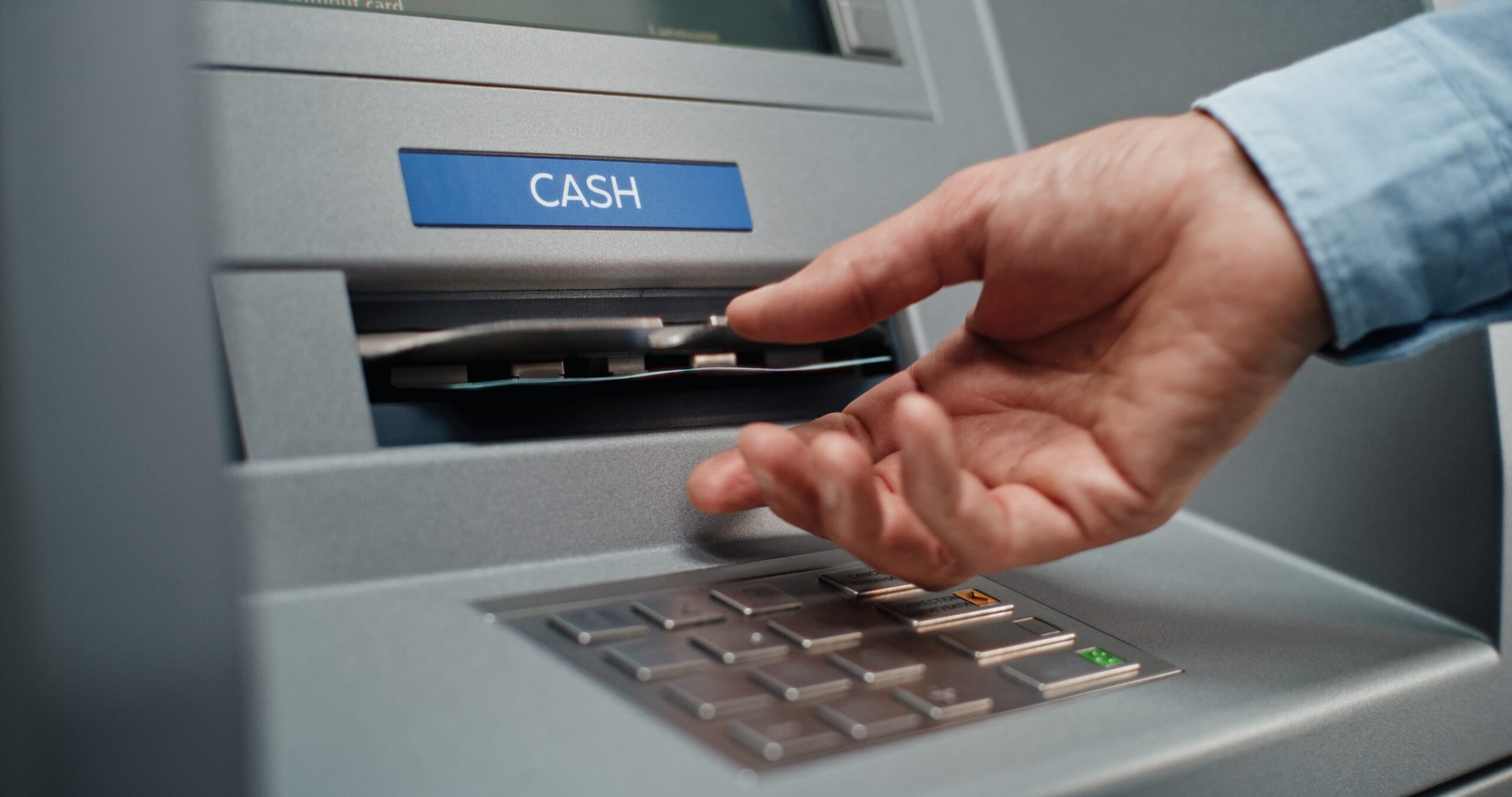 ATM Machine User Pressing Buttons on Display Screen, Taking Money from Cash Dispenser. Cash Withdrawal Operation from Bank Account. Automated Teller Machine, Banking System and Transactions. Close Up.