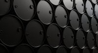 Black oil drums in rows, industrial and energy concept background 3D render