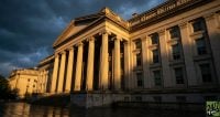 Using the Treasury building as a symbol of institutional power provides a grounded, serious tone. The dramatic lighting and low angle make the economic shift feel monumental and historic, catering to the professional audience of 24/7 Wall St.