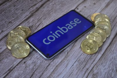 Macro view of gold and silver color shiny coins with Bitcoin symbol