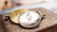 Key and digital money (ETH) Ethereum coin In the ground. Cryptocurrency digital Concept