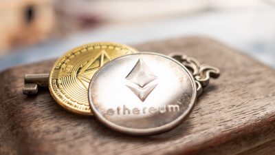 Key and digital money (ETH) Ethereum coin In the ground. Cryptocurrency digital Concept