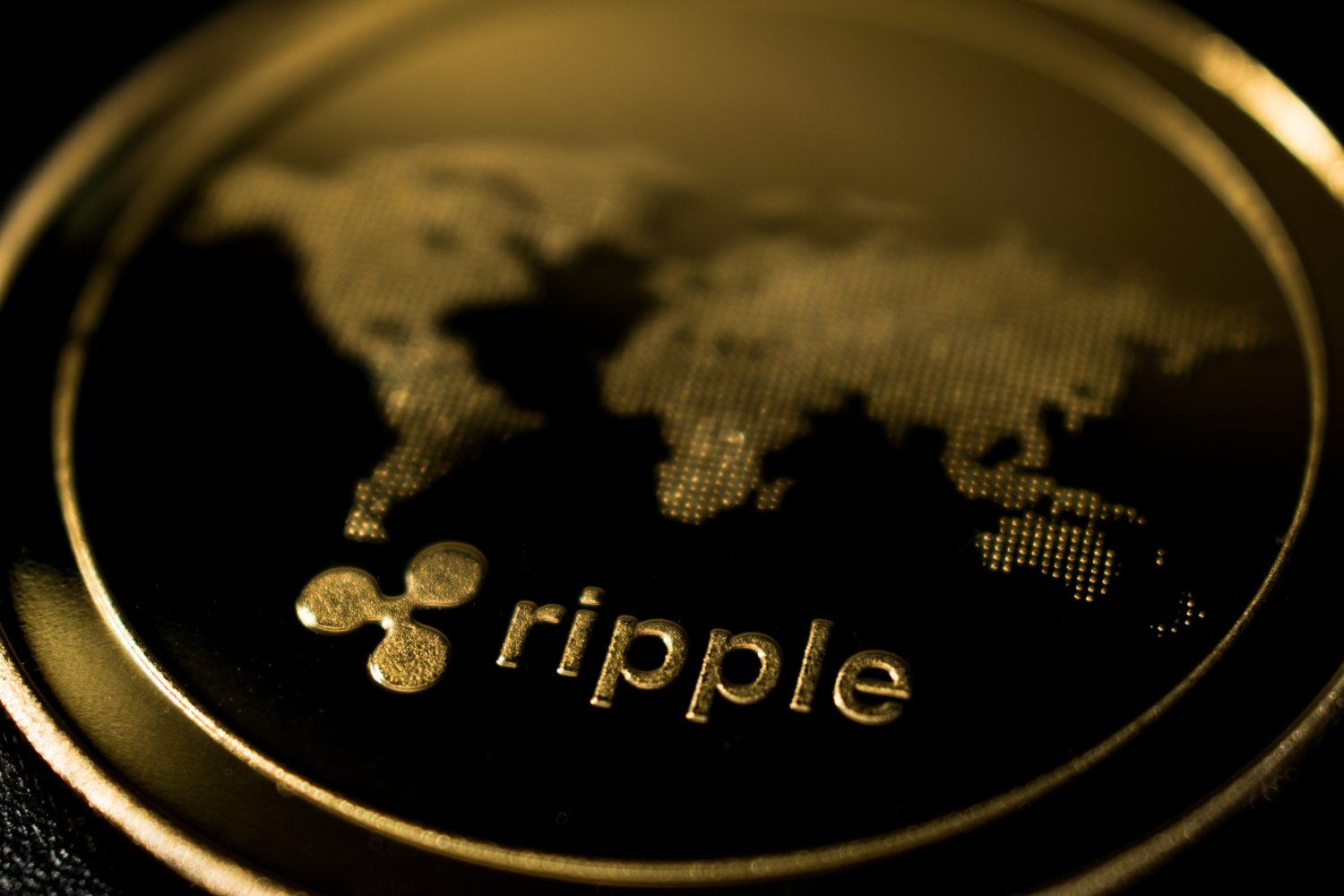Golden Ripple XRP Coin on Black Background