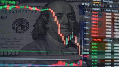 Red Bitcoin Candlestick Chart with US Dollar bills in the Background, crypto market crash. Stock Market collapse and Exchange volatility. Bitcoin Price Evolution. Financial risk, panic and devaluation