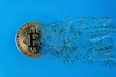 Eroding Bitcoin Digital Gold Melts Away on Blue.