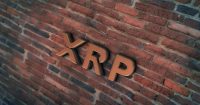 Golden Xrp Coin Symbol 3D Illustration of Stone Wall Background. Golden Xrp Coin Logo. Xrp Coin Sign. 3D Rendering.