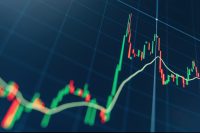Crypto trading market volatility with technical price graph and indicator, red and green candlesticks for analysis up and downtrend of stock market on blue display. Financial diagram.