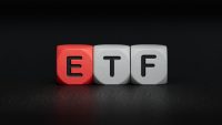 ETF - word concept on building blocks, text, letters.close up of wooden elements,Business Concept.3D rendering on black background.