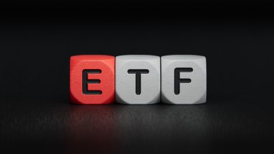 ETF - word concept on building blocks, text, letters.close up of wooden elements,Business Concept.3D rendering on black background.